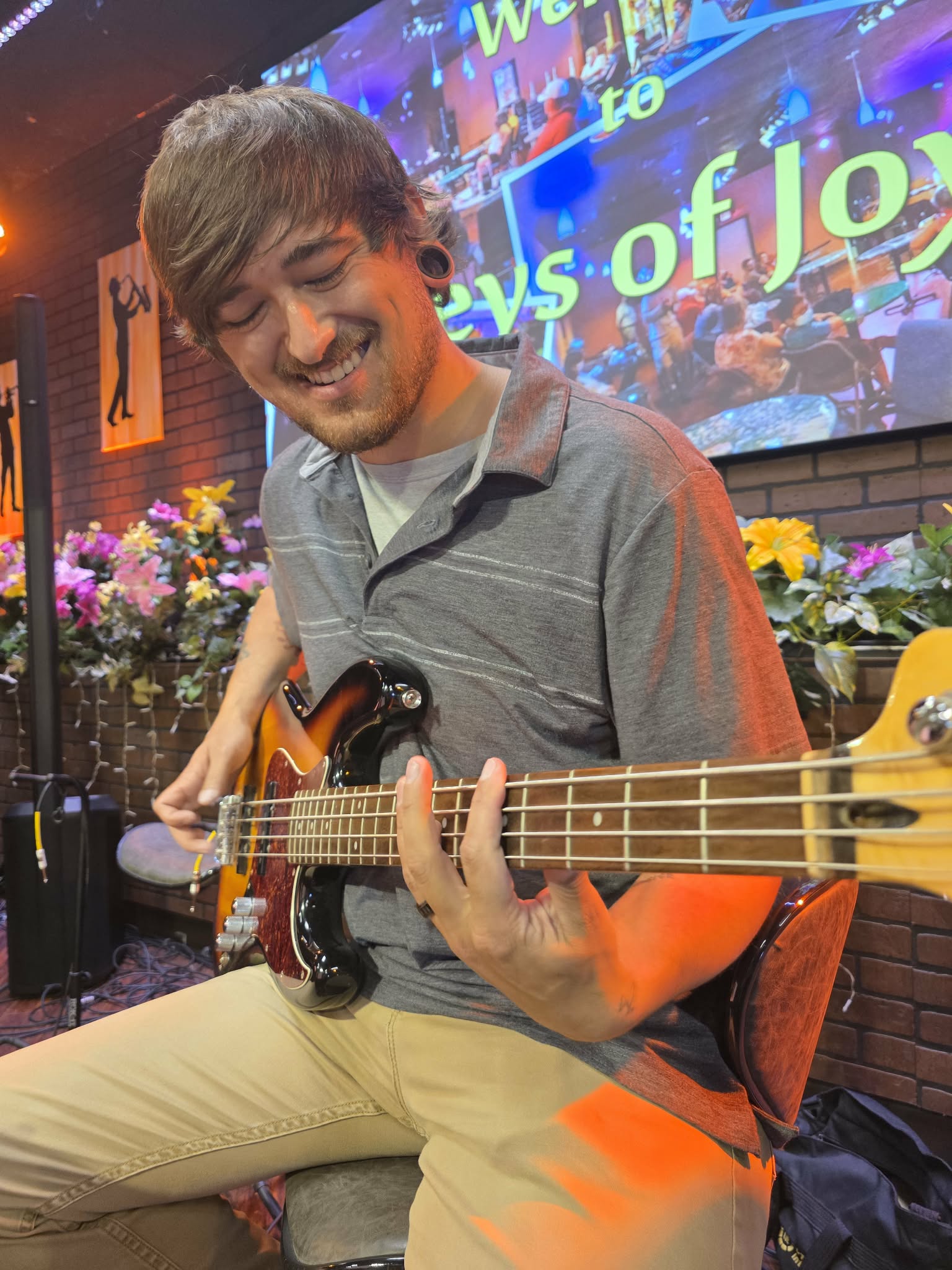 Student playing bass at Keys of Joy! Studio in Lawrence, KS