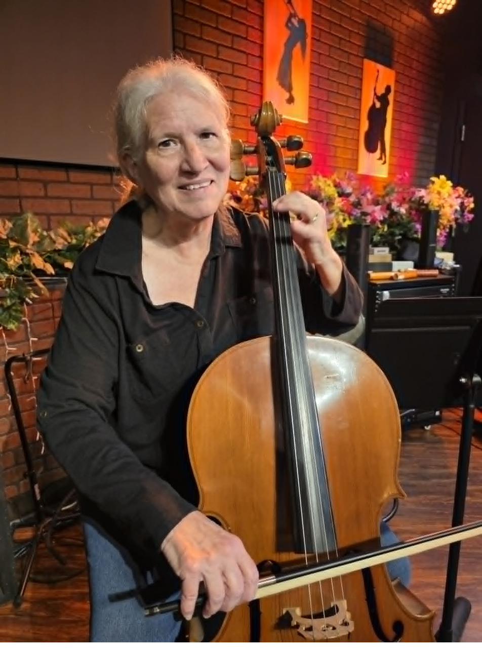 Linda Randel teaching cello at Keys of Joy! Studio in Lawrence, KS