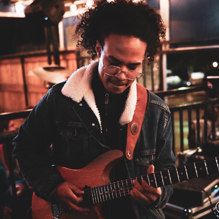Taylor Johnson, guitar and bass instructor at Keys of Joy! Studio